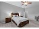 Cozy bedroom with a double bed and wood nightstands at 1040 N 113Th Pl, Mesa, AZ 85207