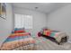 Cozy bedroom with two twin beds, ideal for guests at 1040 N 113Th Pl, Mesa, AZ 85207
