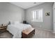 Bright bedroom with a queen-size bed and plenty of natural light at 1040 N 113Th Pl, Mesa, AZ 85207