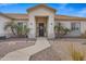 Inviting front entrance with a walkway and mature palm trees at 1040 N 113Th Pl, Mesa, AZ 85207