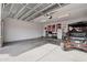 Garage with overhead storage and room for vehicles at 1040 N 113Th Pl, Mesa, AZ 85207