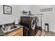 Convenient laundry room with washer, dryer, and utility sink at 1040 N 113Th Pl, Mesa, AZ 85207