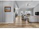 Spacious living area with hardwood floors and an open floor plan at 1040 N 113Th Pl, Mesa, AZ 85207