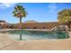 Relaxing pool area with a waterfall feature and landscaping at 1040 N 113Th Pl, Mesa, AZ 85207