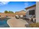 Pool area with patio furniture and access to the house at 1040 N 113Th Pl, Mesa, AZ 85207
