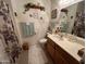 Clean bathroom with updated vanity and fixtures at 10602 W Deanne Dr, Sun City, AZ 85351