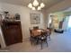 Cozy dining area with a square table and four chairs at 10602 W Deanne Dr, Sun City, AZ 85351