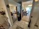 Open entryway with views into living and dining areas at 10602 W Deanne Dr, Sun City, AZ 85351