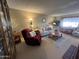 Spacious living room with ample natural light at 10602 W Deanne Dr, Sun City, AZ 85351