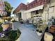 Private patio with seating area and planters at 10602 W Deanne Dr, Sun City, AZ 85351