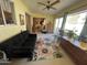 Bright sunroom with view into living room at 10602 W Deanne Dr, Sun City, AZ 85351