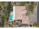 Bird's-eye view of house, pool, and surrounding landscape at 10606 N Indian Wells Dr, Fountain Hills, AZ 85268