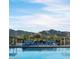 Stunning community pool with mountain views at 12331 W Parkway Ln, Avondale, AZ 85323