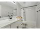 Clean bathroom with white subway tile, bathtub, and updated vanity at 13021 N 41St Pl, Phoenix, AZ 85032