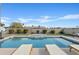 Inviting swimming pool with spacious deck and lounge chairs at 13021 N 41St Pl, Phoenix, AZ 85032