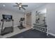 Home gym with treadmill, stationary bike, weights and mirror at 13141 W Crestvale Dr, Peoria, AZ 85383