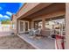 Backyard with patio, storage shed and grassy area at 13450 W Maui Ln, Surprise, AZ 85379