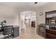Home hallway view with access to kitchen and other rooms at 13450 W Maui Ln, Surprise, AZ 85379