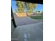 Artificial turf and paved backyard patio at 13622 W Peck Ct, Litchfield Park, AZ 85340
