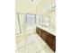 Double vanity bathroom with soaking tub and shower at 13622 W Peck Ct, Litchfield Park, AZ 85340