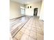 Spacious living room featuring tile and wood-look flooring at 13622 W Peck Ct, Litchfield Park, AZ 85340