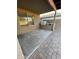 Covered patio with built-in grill and spacious concrete area at 13622 W Peck Ct, Litchfield Park, AZ 85340