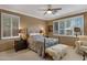 Spacious bedroom with a queen bed and nightstand at 141 W Roadrunner Dr, Chandler, AZ 85286