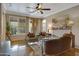Living area with hardwood floors and french doors at 141 W Roadrunner Dr, Chandler, AZ 85286