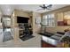 Home office features a desk, treadmill, and plenty of natural light at 141 W Roadrunner Dr, Chandler, AZ 85286