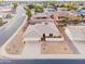 Aerial view of the house, street, and neighborhood at 14202 N Buttercup Dr, Sun City, AZ 85351