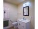 Bright bathroom with a sink, toilet, and mirror at 14202 N Buttercup Dr, Sun City, AZ 85351