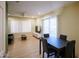 Dining area with table and chairs, and access to a living room at 14202 N Buttercup Dr, Sun City, AZ 85351