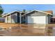 Single-story home with gray exterior, attached garage, and mature landscaping at 1510 E Edgewood Ave, Mesa, AZ 85204