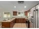 Modern kitchen with granite countertops and stainless steel appliances at 1510 E Edgewood Ave, Mesa, AZ 85204