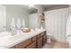 Clean bathroom with double sinks and a shower/tub combo at 17815 N 81St Way, Scottsdale, AZ 85255