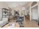 Open concept living area with neutral tones and a view to the kitchen at 17815 N 81St Way, Scottsdale, AZ 85255