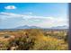 Aerial view of community, showcasing desert landscape and mountain views at 20100 N 78Th Pl # 3088, Scottsdale, AZ 85255