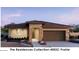 Single-story home with two-car garage and desert landscaping at 20596 N 226Th Dr, Surprise, AZ 85387