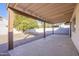 Covered patio with gravel yard and mature tree at 2258 S Canton --, Mesa, AZ 85202