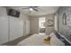 Bedroom view showcasing closet, ceiling fan and ensuite bathroom at 23820 W Mobile Ln, Buckeye, AZ 85326