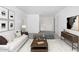 Living room with a sofa and a coffee table at 24206 W Hidalgo Ave, Buckeye, AZ 85326