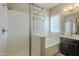 Modern bathroom with soaking tub and walk-in shower at 2931 E Citrus Way, Chandler, AZ 85286
