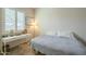 Bright bedroom with a queen-size bed and a workspace at 2931 E Citrus Way, Chandler, AZ 85286