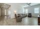 Living room with hardwood floors, comfortable seating, and natural light at 2931 E Citrus Way, Chandler, AZ 85286