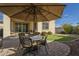 Outdoor patio space with seating and umbrella at 2931 E Citrus Way, Chandler, AZ 85286