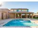 Community pool with covered seating and nearby restrooms at 2931 E Citrus Way, Chandler, AZ 85286