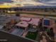 Aerial view of house and surrounding golf course community at 3182 N 159Th Dr, Goodyear, AZ 85395