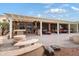 Large backyard patio with pergola, seating area, and water feature at 3182 N 159Th Dr, Goodyear, AZ 85395