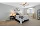 Cozy bedroom with a queen-size bed and ample closet space at 3182 N 159Th Dr, Goodyear, AZ 85395