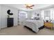 Charming bedroom with a queen bed and neutral color palette at 3182 N 159Th Dr, Goodyear, AZ 85395